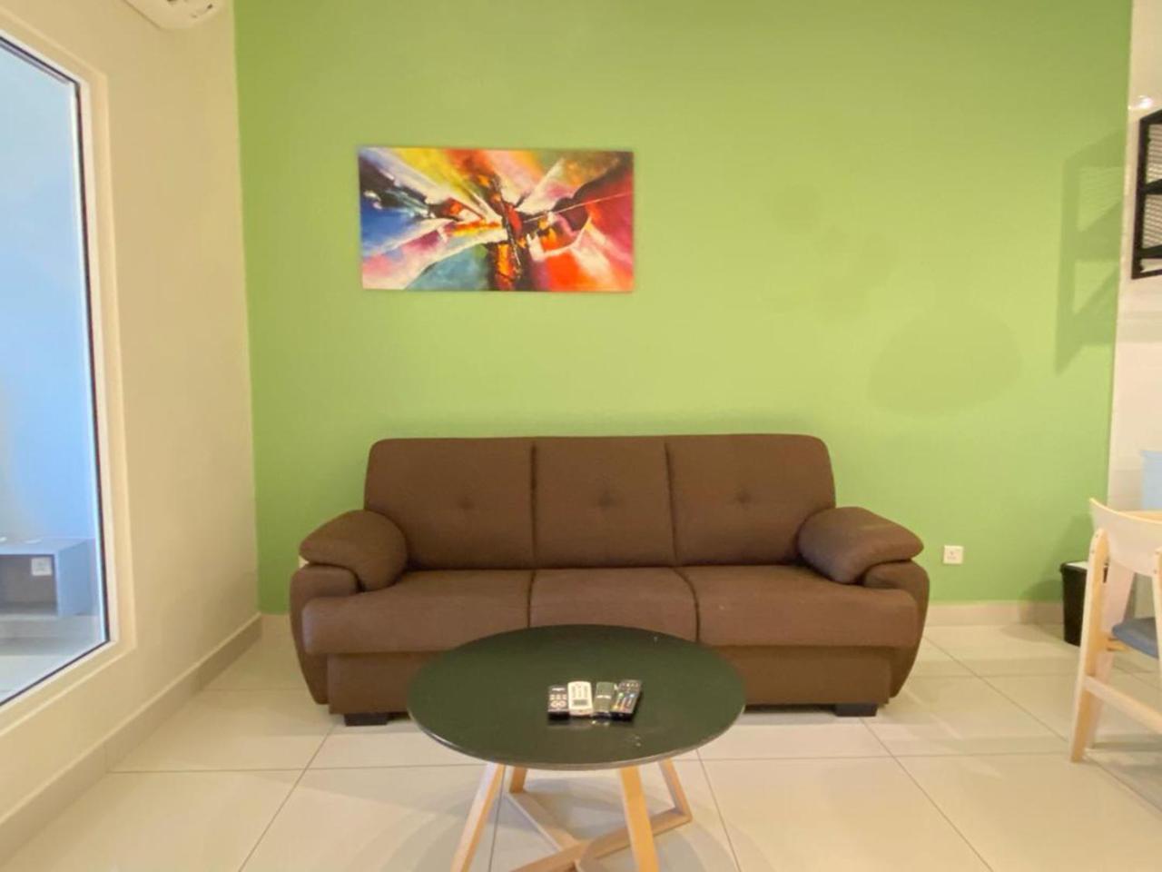 Aparthotel Arte Mont Kiara Kuala Lumpur Exterior foto A living room with a sofa
