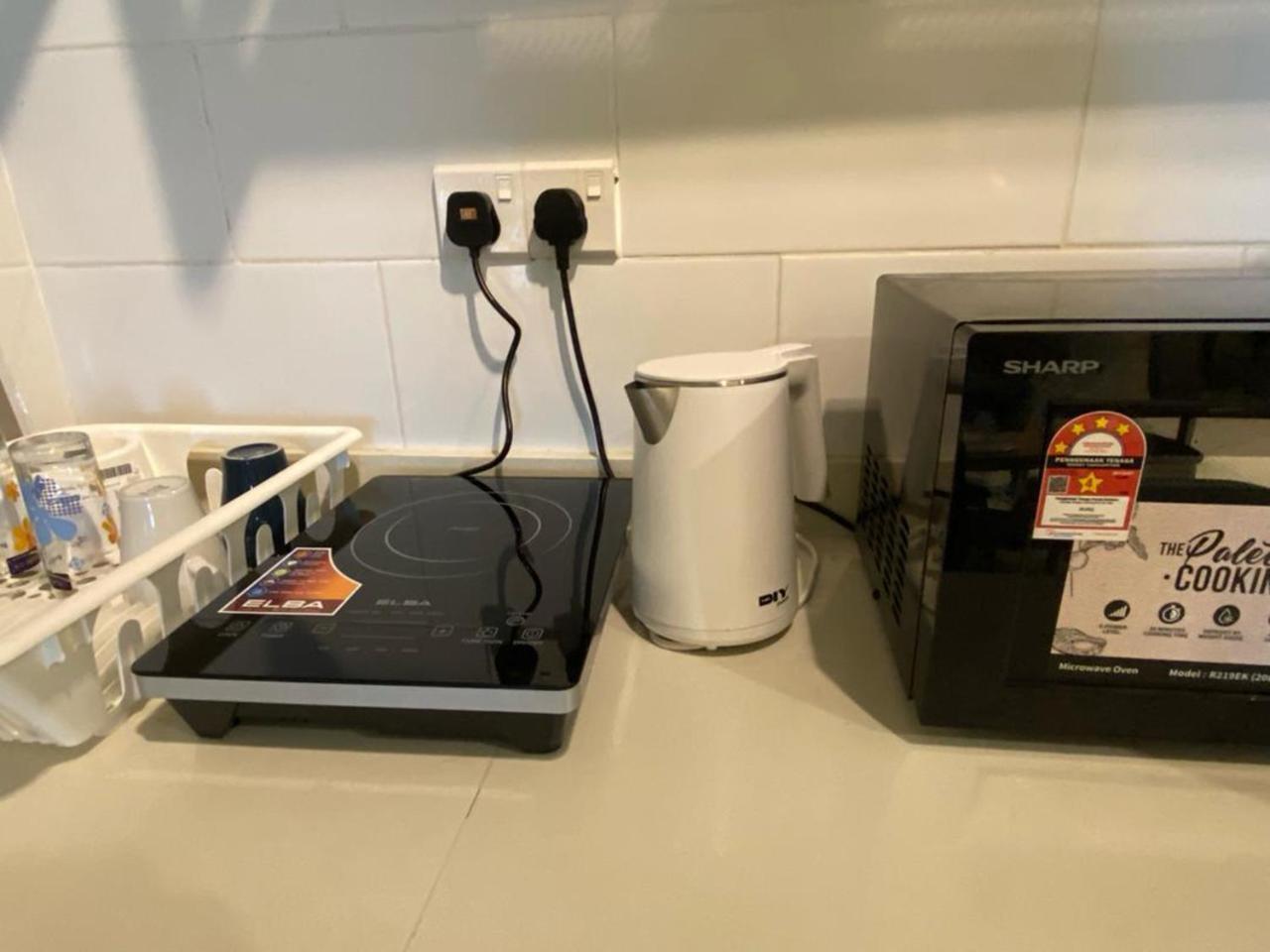Aparthotel Arte Mont Kiara Kuala Lumpur Exterior foto A kettle and a microwave oven